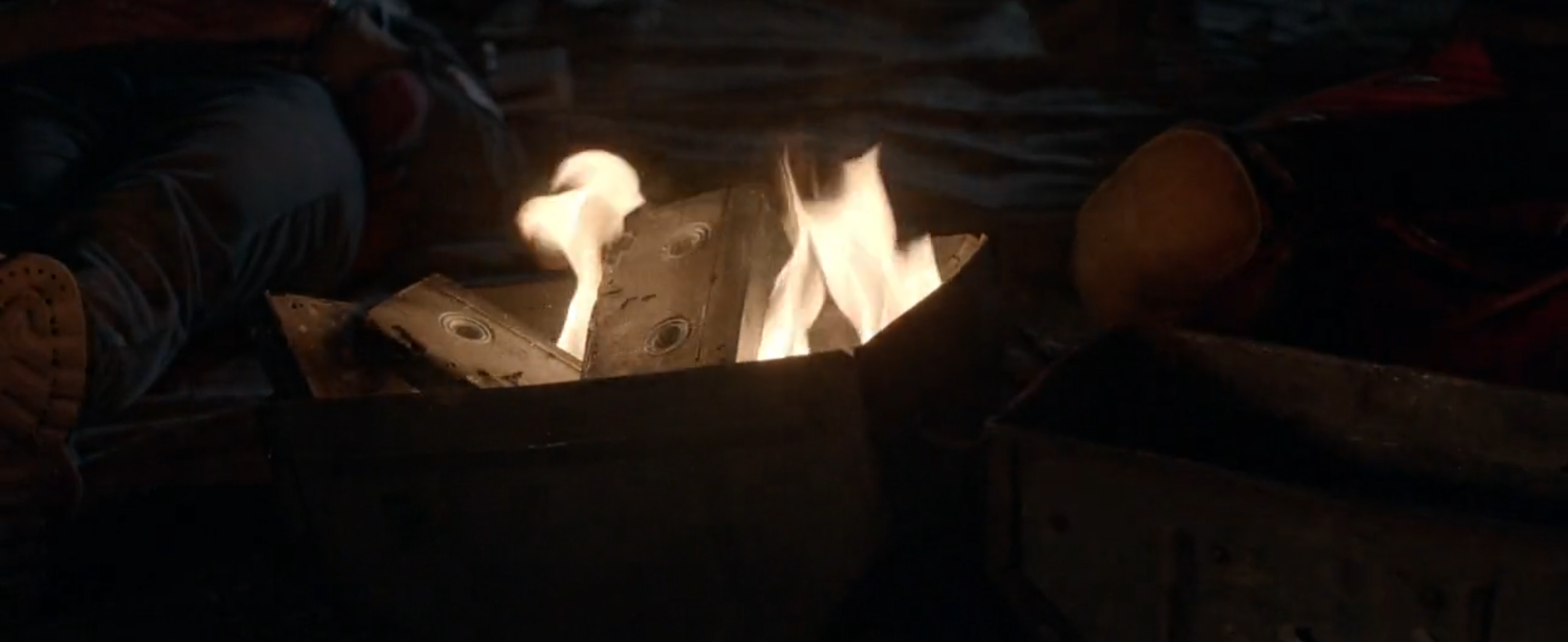 The meme appears to be a screenshot from the TV show "Stranger Things" where a character is being burned at the stake. The text "They're gonna burn!" is overlaid on the image, likely referencing the character's impending fate.